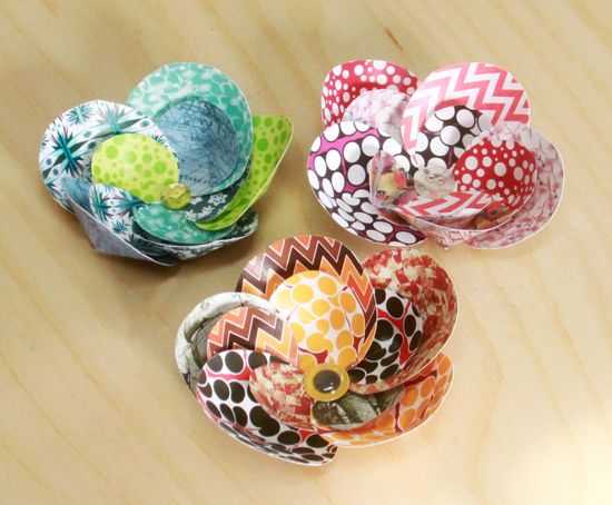 Como Fazer Flores com Círculos de Papel Flores com círculos de papel além de baratas são diferenciadas (Foto: worldofpineapple.com)