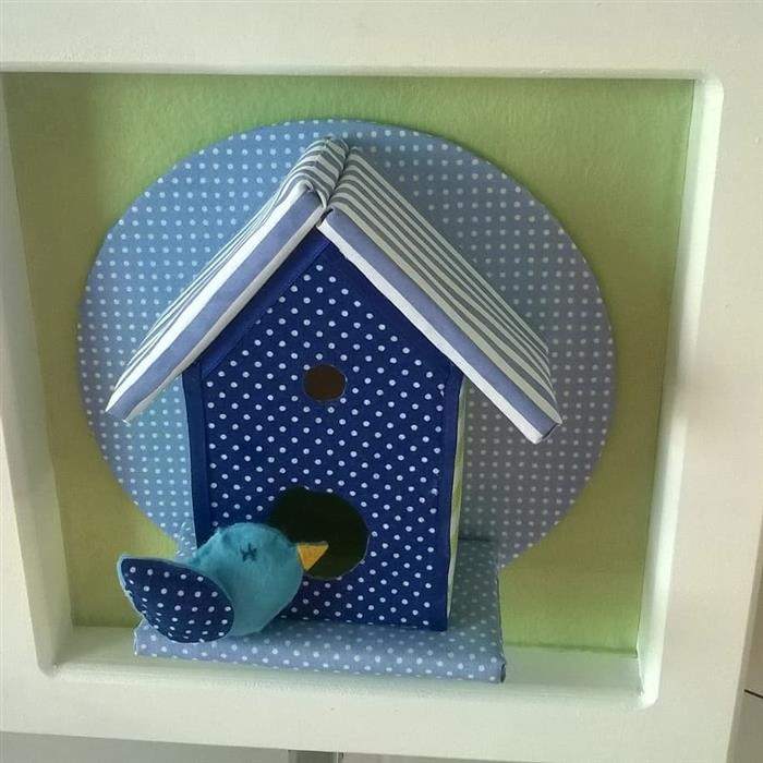 casinha no nicho feita com caixa de leite